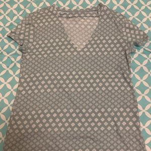 Blue and white shirt with low cut chest